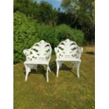A pair of Coalbrookdale cast iron Fern and Blackberry chairs