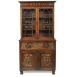 A George III mahogany break front bookcase