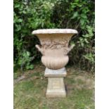 A terracotta urn on pedestal