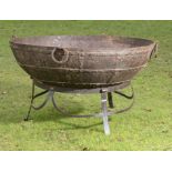 †A wrought iron kadai on stand