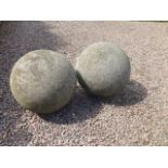A pair of large composition stone balls