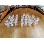 x30 selection of highly decorative cut glass wine and sherry glasses.
