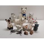 13 Pieces of Pottery 10 cats 2 ducks and a donkey Including 1 Beswick Cat (Damaged Ear to Donkey)