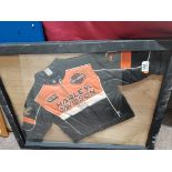 Harley Davison leather child's bike jacket framed and ltd. edition from main dealers
