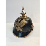 WW1 Pickehaube with wing spread eagle helmewappen. Only one ear disc, no chin strap leather enlisted