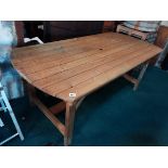 Oval wood garden table