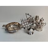 Siler Toast rack, x2 Silver pepper pots, x2 Silver mustard pots and a silver bowl