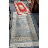 2 x Chinese style rugs - one red, one pale green