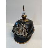 WW1 Pickehaube with Silver coloured double lion helmewappen with coloured cross. Enlisted mans class