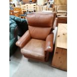 Tan leather recliner armchair