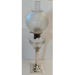 Tall Silver plated oil lamp with glass original shade and Corinthian column
