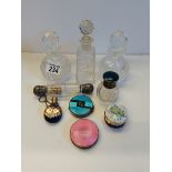 Selection of perfume bottles and compacts