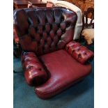 Leather chesterfield high backed armchair