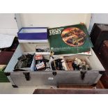 Tin trunk with boxed matchbox toys, coins, Action men Meccano army multikit etc