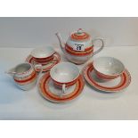 White and Orange tea set x2 cups, x3 saucers x1 milk jug, x1 tea pot, x1 sugar bowl Societe
