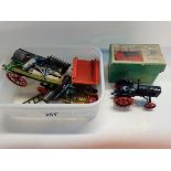 Boxed toy Fordson Major tractor with spudded metal wheels and a selections of toy metal farms
