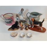 8 Pieces of Pottery 2 Dogs 3 figures 8 pieces of dolls house tea Service and two Jugs