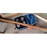 Fishing rods and set of bowls in bag