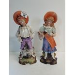 Victorian figures of boy and girl