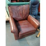 Brown leather armchair