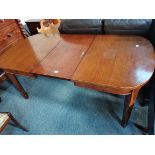 Antique extendable dining table