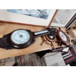 Barometer, clock and ship's wheels