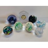 X7 glass paperweights and a glass mantle clock