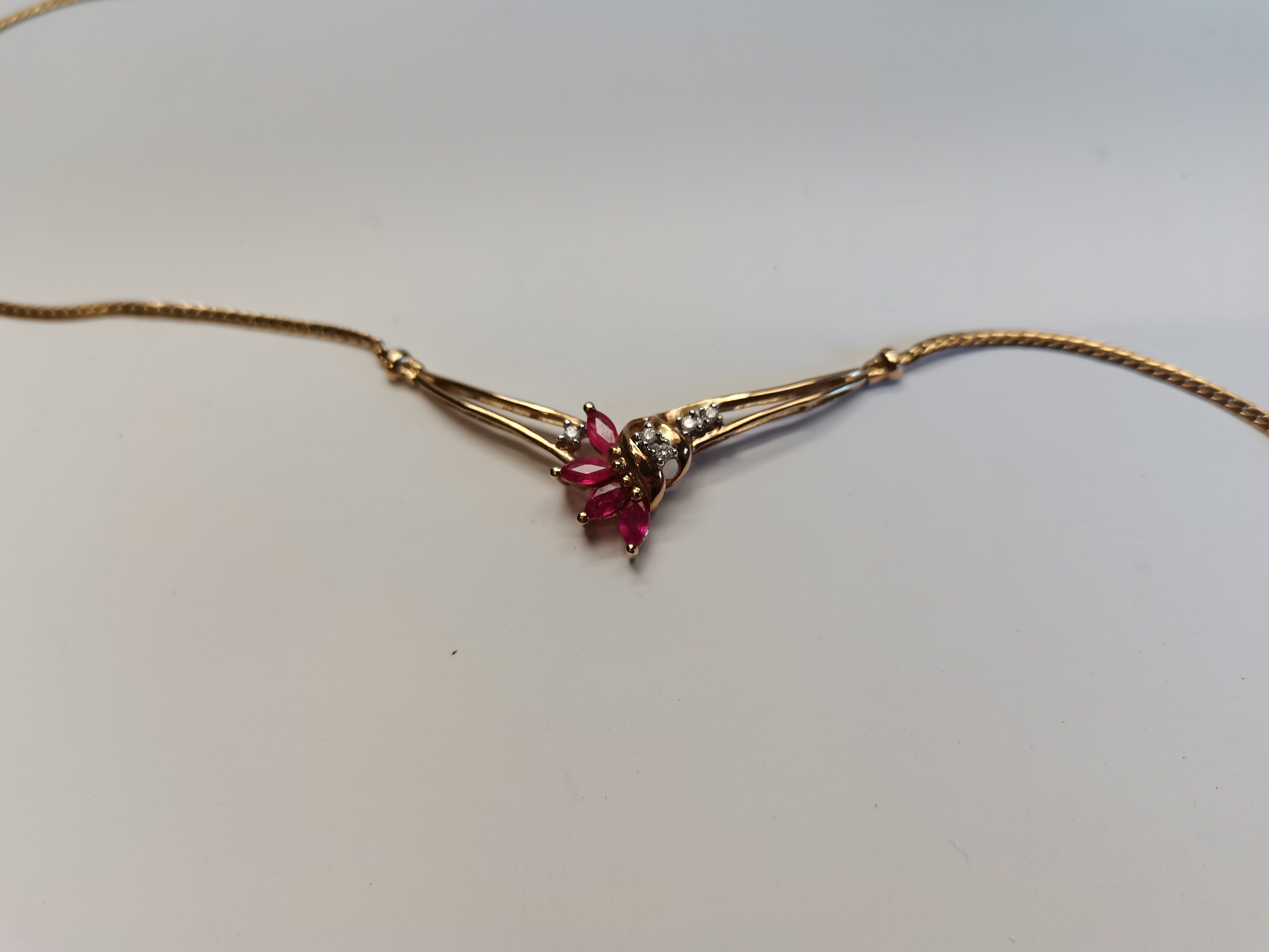 Gold necklace with Rubies and Diamonds