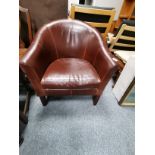 Brown leather tub chair