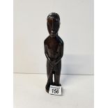 19th Century African carved hardwood figure of male chieftain with staff and loin cloth