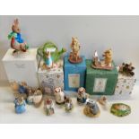 Mixture of Beatrix Potter and Winnie the Pooh figures