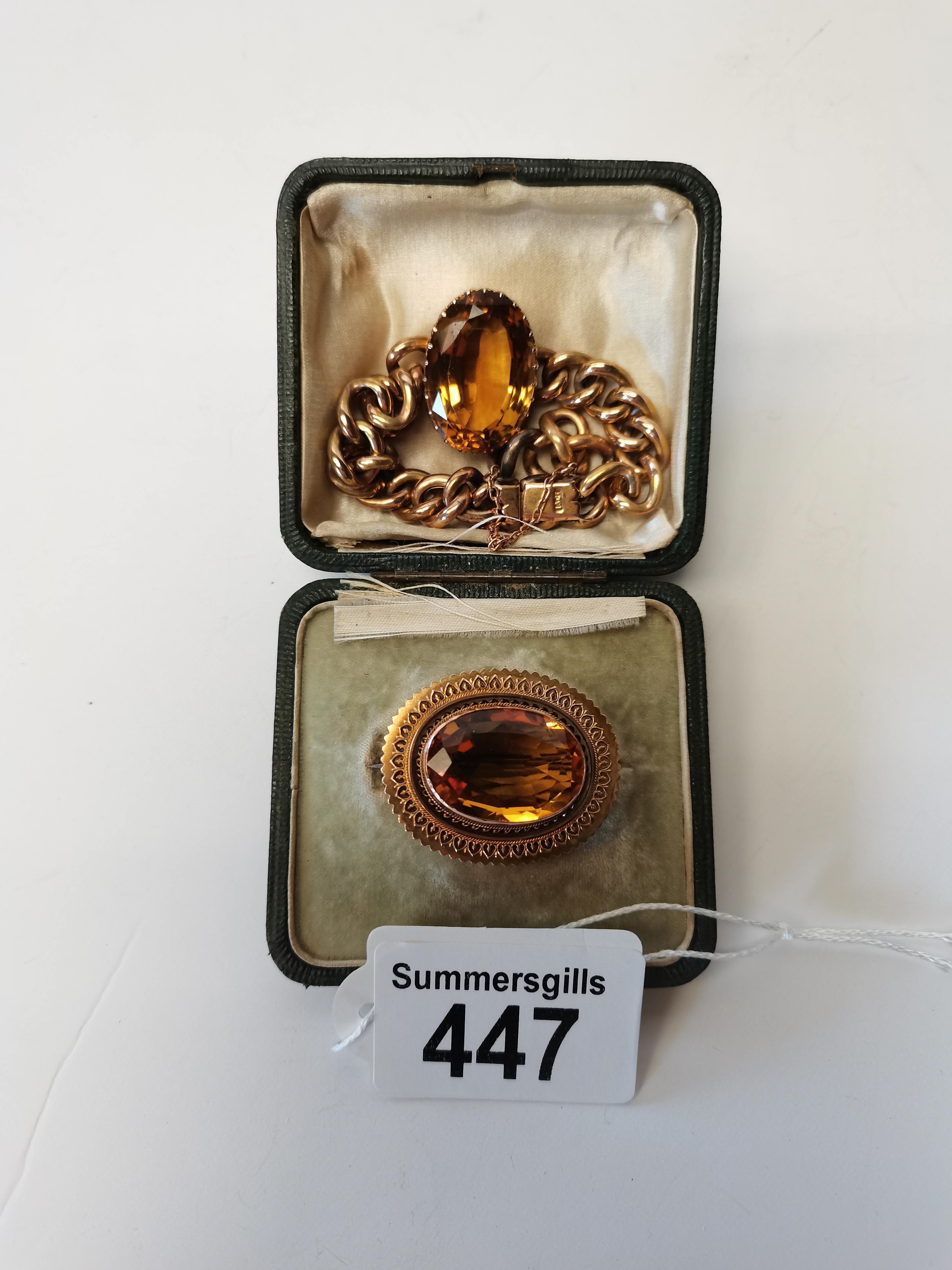 Oval Bracelet with Citrine 30.98 carats and an Oval Brooch with Citrine 16.49 carats