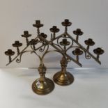 2 Triangular Brass Candlesticks