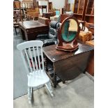 Oak Drop leaf dining table with Barley twist gateleg, oval mirror and small white rocking chair