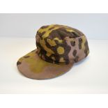 WW2 German military camouflage cap. Green reversible to brown worn with some staining to crown