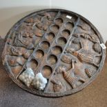 Circular carved African games table