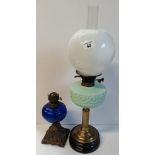 Green and Brass Oil Lamp with another Blue and Brass lamp bottom