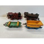 Marklin clockwork train and Hornby train with trucks