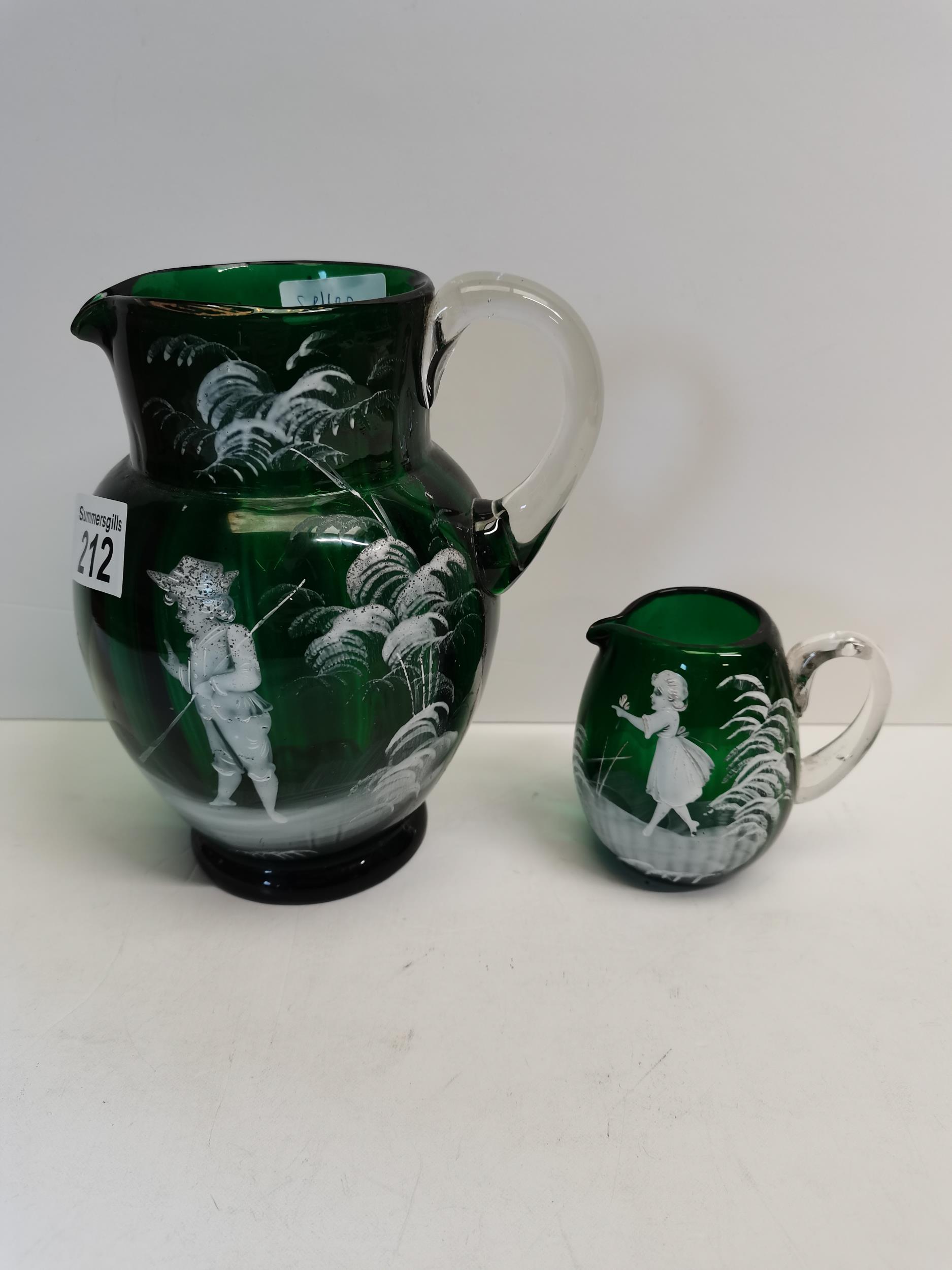 x2 Mary Gregory glass jugs