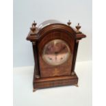 A Marquetry inlaid quarter striking Mantle clock