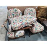 2 x dark Ercol style armchairs and footstool