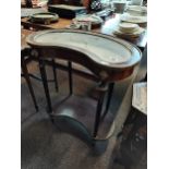 Antique kidney shaped jewellery display table with brass details