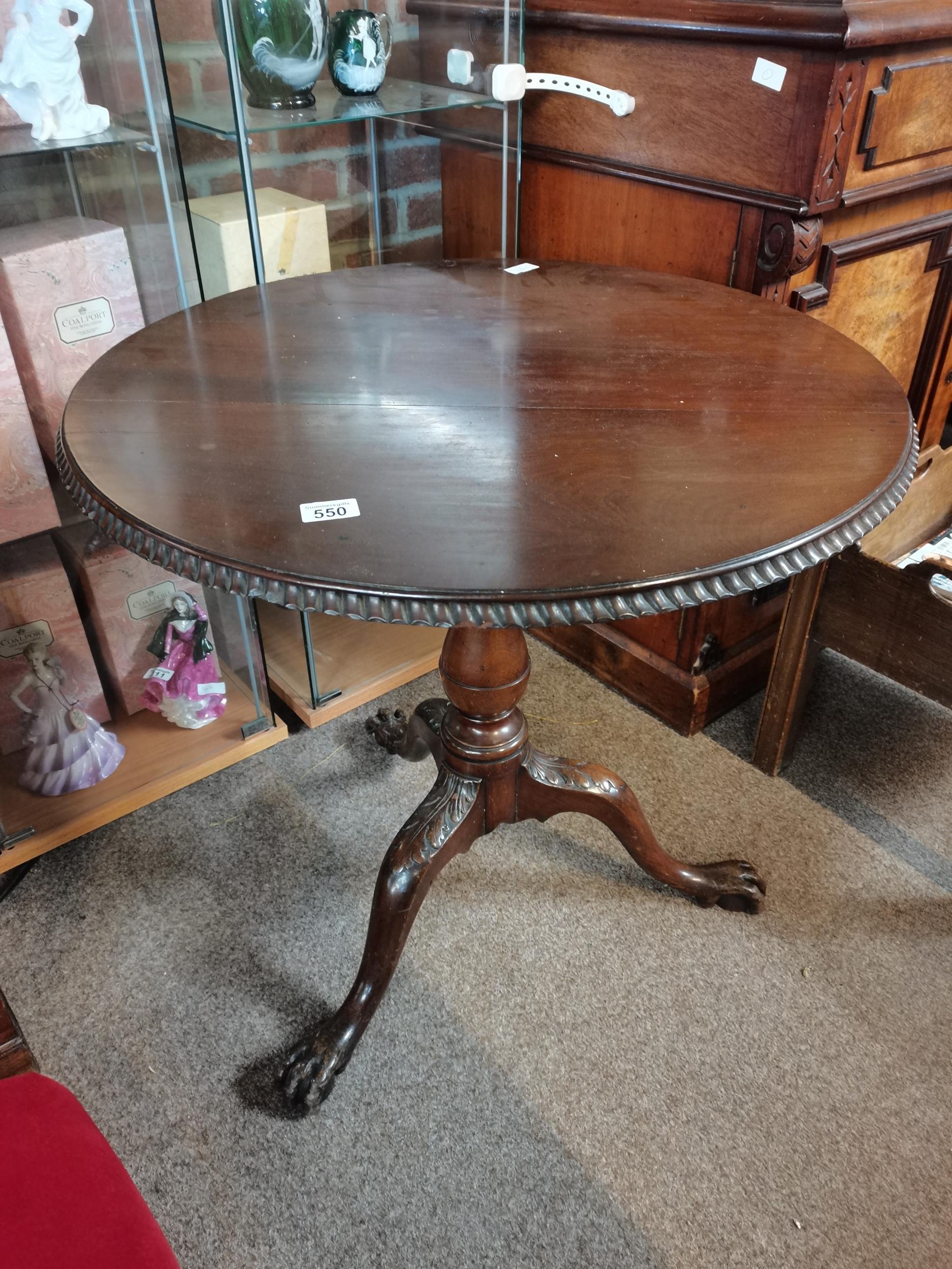 Antique pie crust round table with claw feet