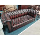 Ox-blood red leather Chesterfield sofa