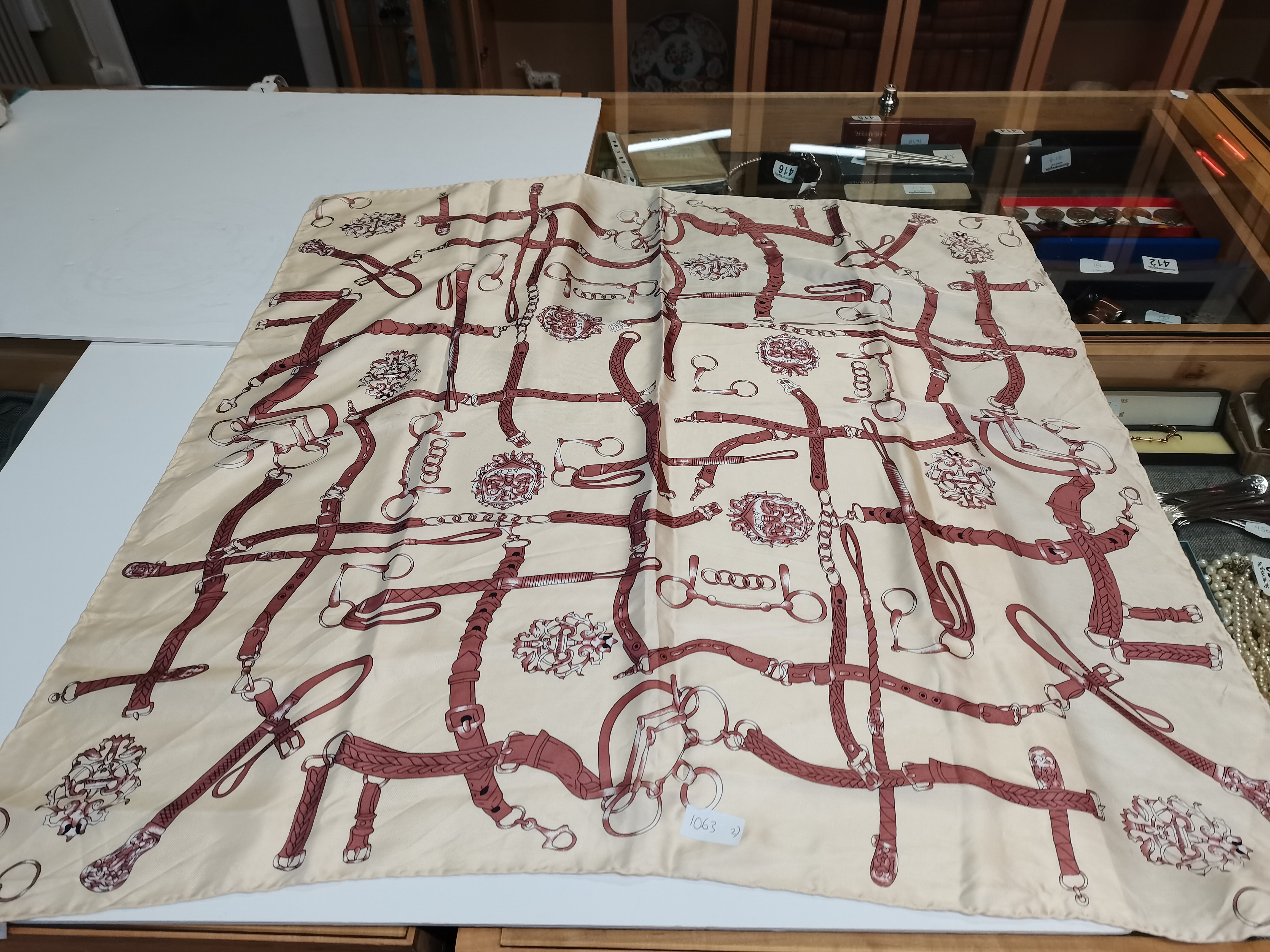 Genuine Hermes silk scarf, cream and brown with hand rolled hems. 33" x 33". Good vintage condition