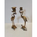 Pair of 28cm brass candlesticks with a flamingo turtle and snake 1880s possibly Chinese. One has a