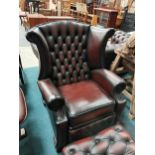 Ox-blood red leather reclining high back armchair