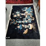 Blue and cream Chinese rug - 183cm x 135cm - very good condition no fading or signs of wear