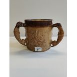 A stoneware Doulton style 3 handled hunting jug 18cm high ( slight chips )