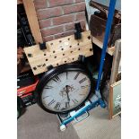 Workbench, large wall clock and a Car Jack
